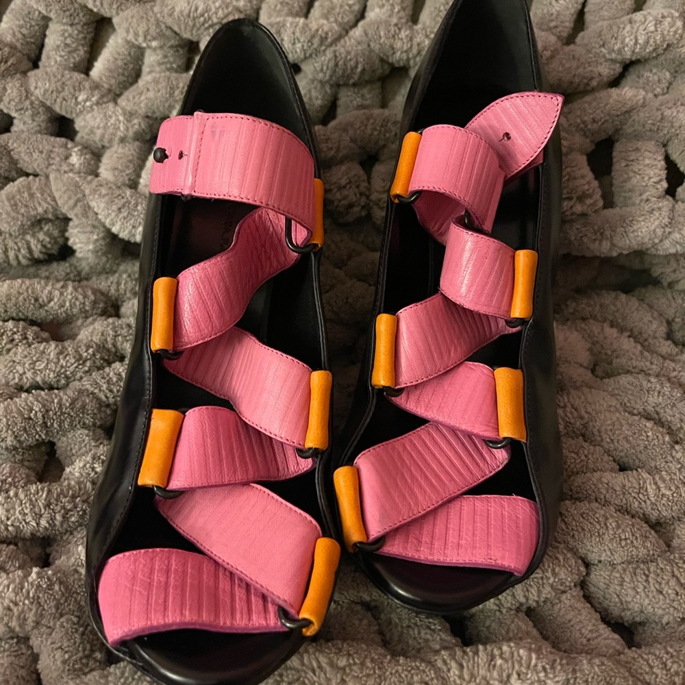 Brand new. Run one size small than the real size.  Good for size 36.